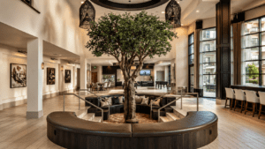 Elegant hotel lobby with tree centerpiece Elegant hotel lobby with tree centerpiece